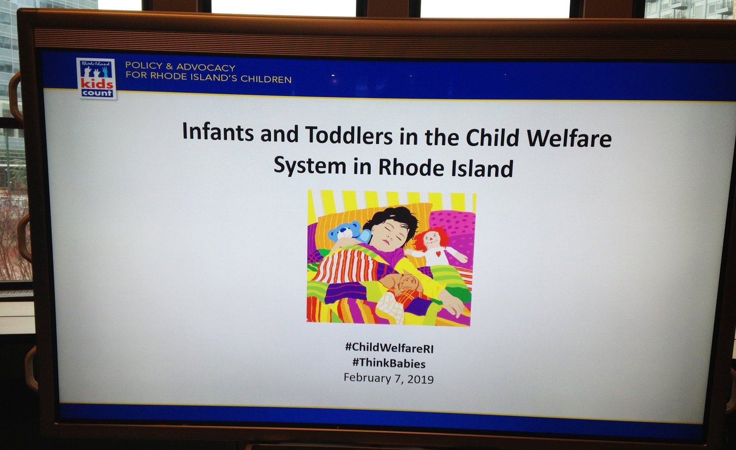 The opening slide on the big display screen at the Feb. 7, 2019, discussion on the new Issue Brief prepared by Rhode Island Kids Count.
